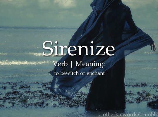 there is a woman standing in the water with her scarf around her neck and words on it that read, sirenize verbb i meaning to be witch or enchant