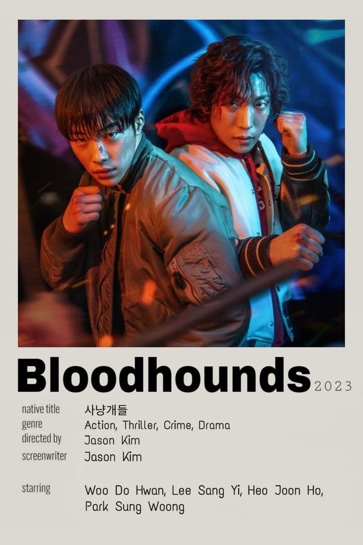 two young men standing next to each other in front of a poster for bloodhounds