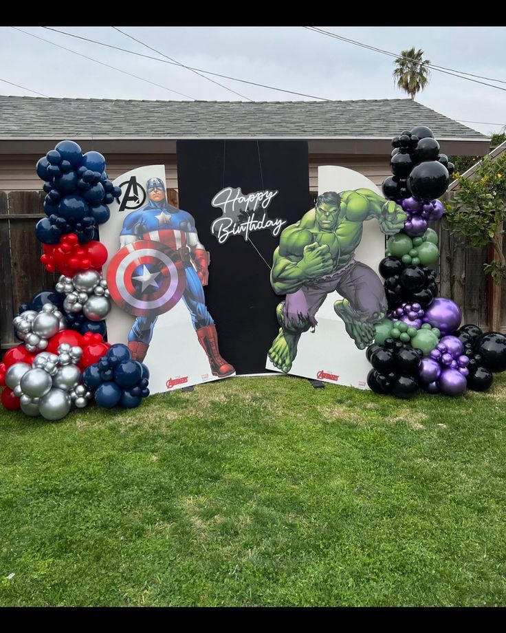 balloons are arranged in the shape of avengers and captain america on display at a birthday party