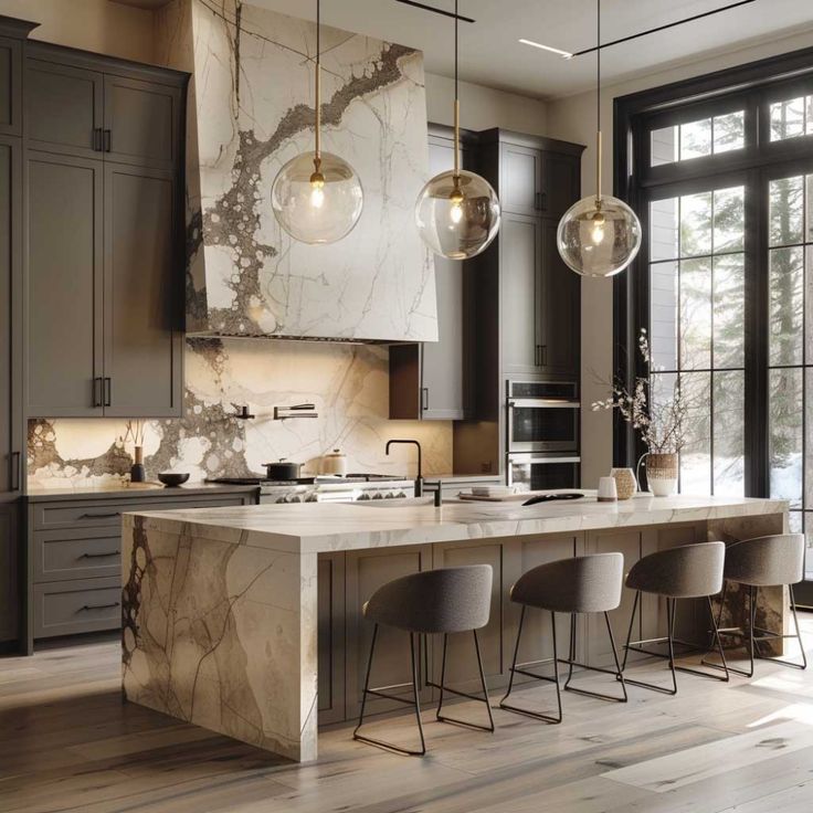 a kitchen with marble counter tops and stools in front of an open floor plan