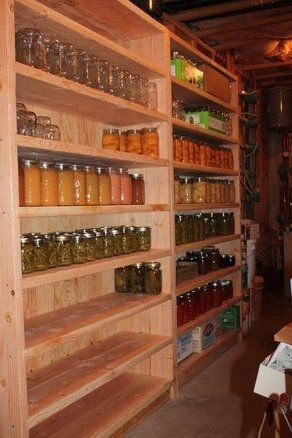 the shelves are filled with many different kinds of jars