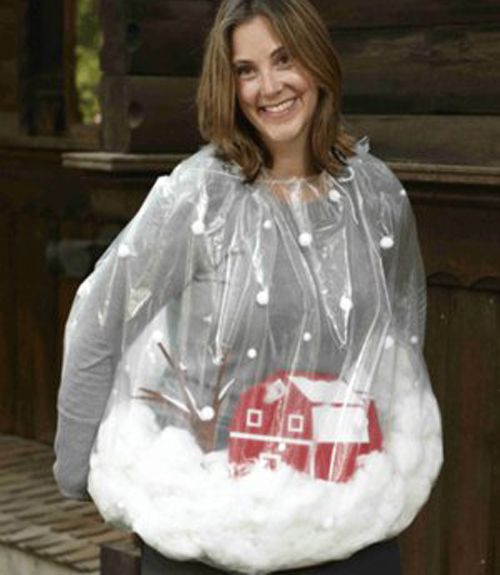 a woman wearing a plastic bag with a red house on it and white fur around her shoulders