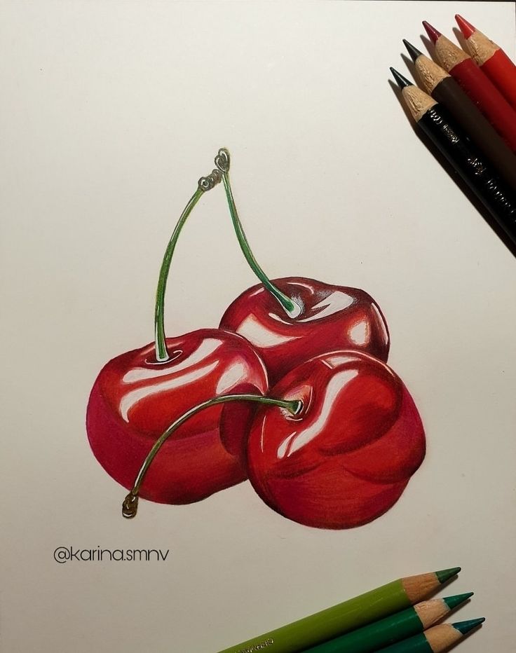 a drawing of two cherries with colored pencils