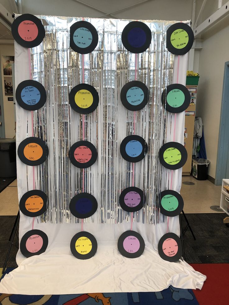 a display with many different colored discs on it