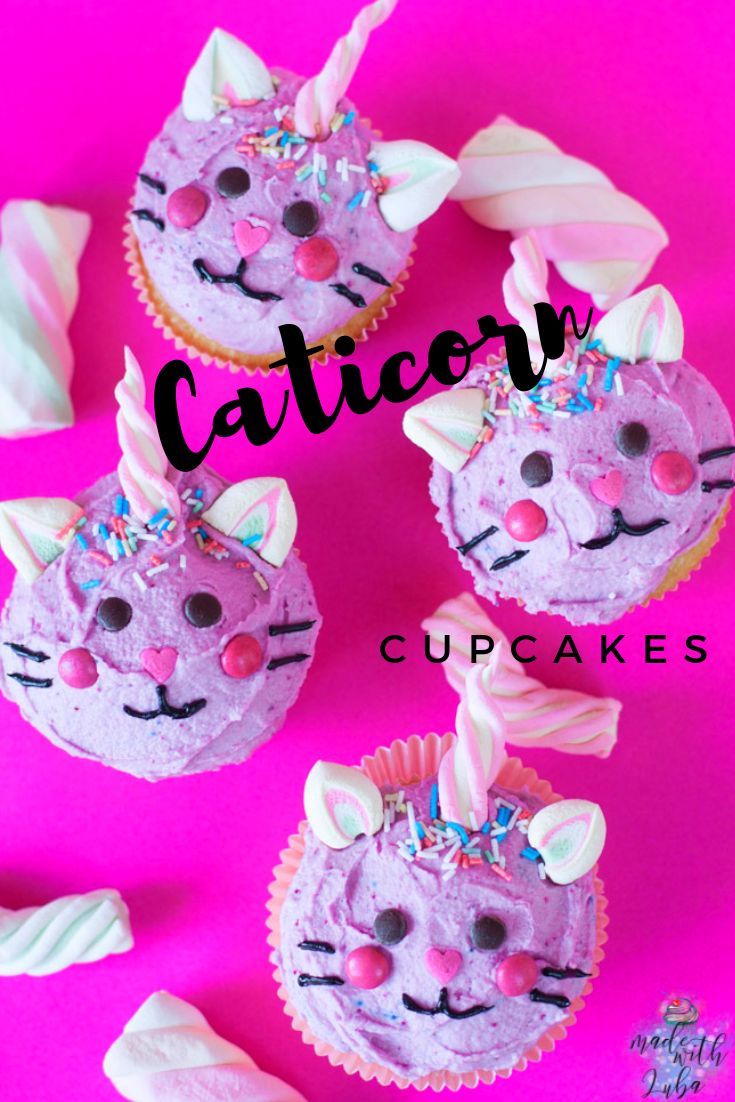 three cupcakes with cat faces on them