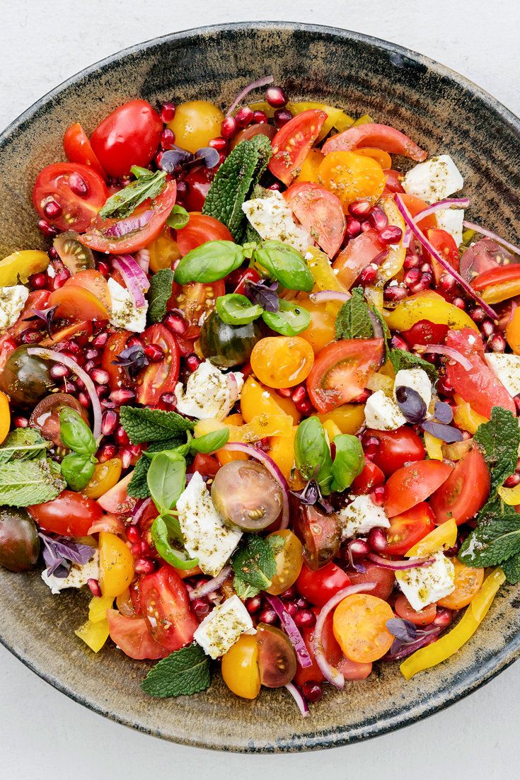 a bowl filled with lots of different types of vegetables