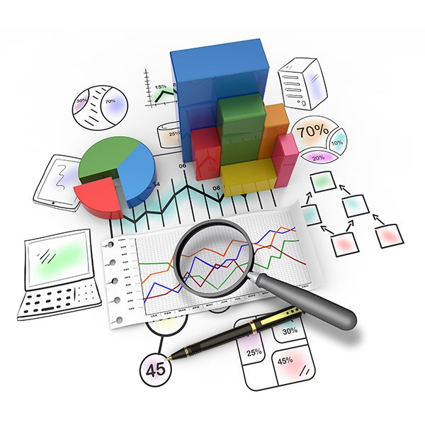 a magnifying glass sitting on top of papers with graphs