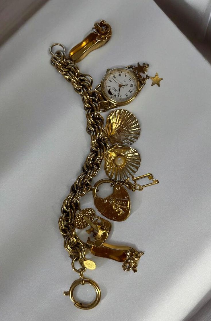 Beautiful Vintage Kirk's Folly Gold Tone Watch Chunky Chain Bracelet. The Watch is quartz and the length is 6.75 with generous sized charms. Very adorable.