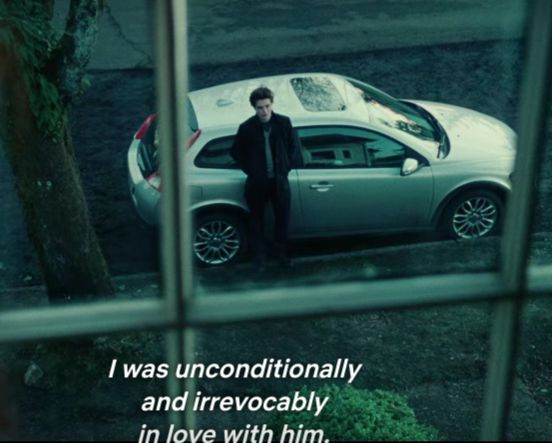 a man standing in front of a car with the caption i was unconditionalally and irrecocably in love with him