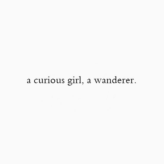 a white wall with the words a curious girl, a wanderr