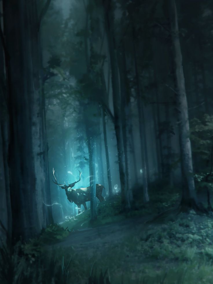 a deer in the middle of a forest with light coming from it's antlers