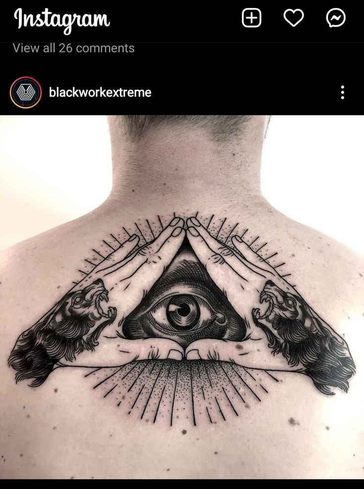 a man's back with an all seeing eye tattoo on his chest and the words instagram view all 20 comments