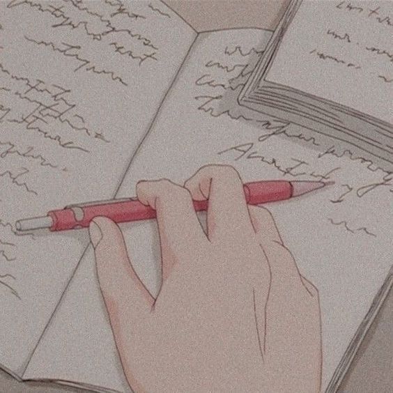 a hand holding a red pen writing on top of an open book with pages written in cursive writing