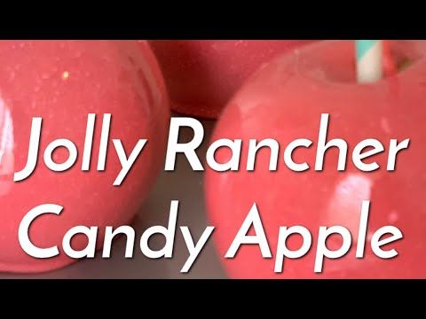 three red apples with the words jolly rancher candy apple