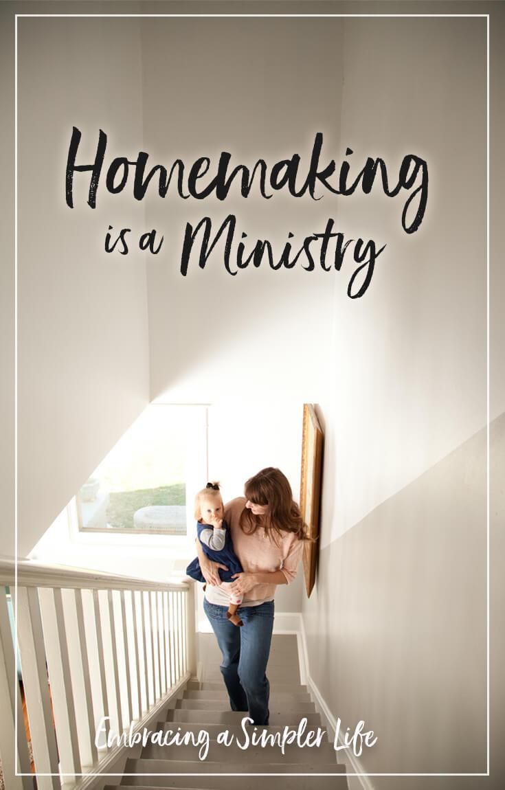 a woman holding a baby in her arms while walking down stairs with the words, homemaking is a minister