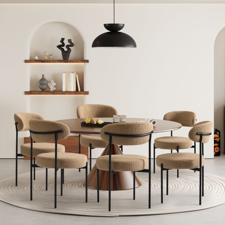 a dining room table with six chairs and a round rug on the floor in front of it