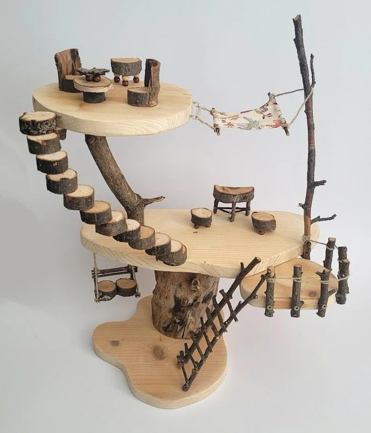 a tree house made out of wood and branches with chairs on the bottom floor, in front of a white background