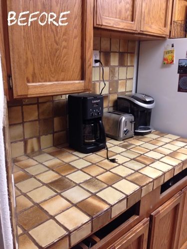 the kitchen counter is clean and ready to be used as a coffee maker or toaster