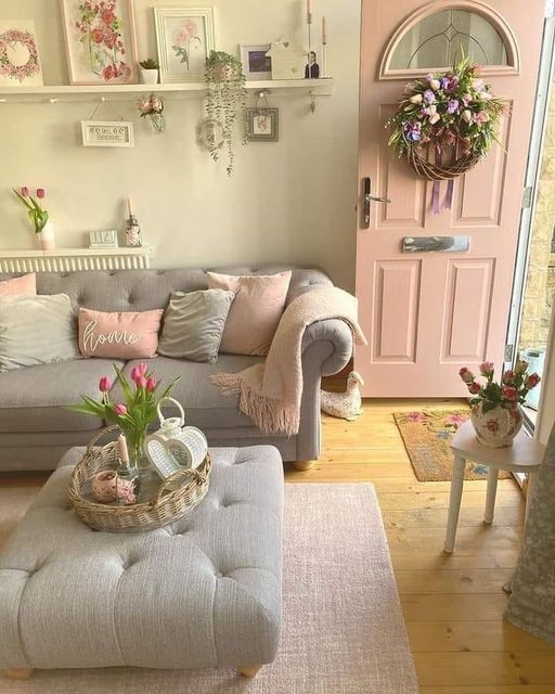 a living room filled with furniture and flowers