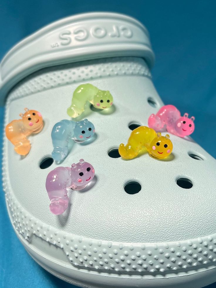 🌈✨ Meet our Colorful Glow-in-the-Dark Caterpillar 3D Croc Charms - the tiny critters with a glow-up mission! 🐛💫 Clip these whimsical wonders onto your Crocs and watch as your feet light up the night like a magical rainbow parade! 🌟 Perfect for adding a dash of enchantment to every step, these caterpillars come in a kaleidoscope of colors and bring the party wherever they go! 🎉👟 Get ready to dance through the dark with these glow-tastic companions - because your shoes deserve to be the life of the luminescent party! 🌈👣 🐛✨ **expose to direct sunlight for at least two hours to experience full glow** Caterpillar Shoes, Magical Rainbow, Light Up The Night, Croc Charms, Shoe Insoles, Shoe Charms, Caterpillar, In The Dark, Glow In The Dark