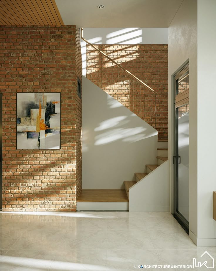 a brick wall and stairs in a house