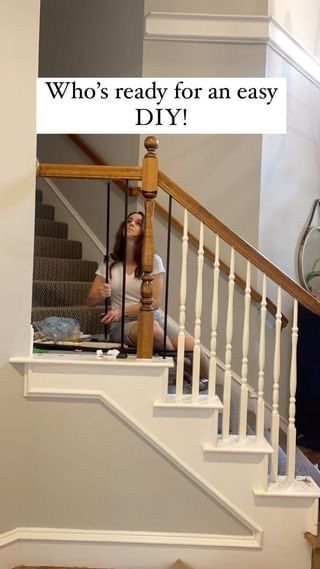 a woman sitting on top of a stair case next to a white banister with the caption who's ready for an easy diy?