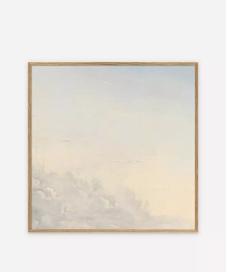 an abstract painting with white clouds and blue sky in the background, framed in wooden frame