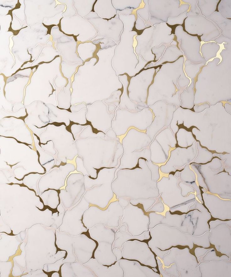 an abstract marble pattern with gold and white highlights on the top, as well as some black