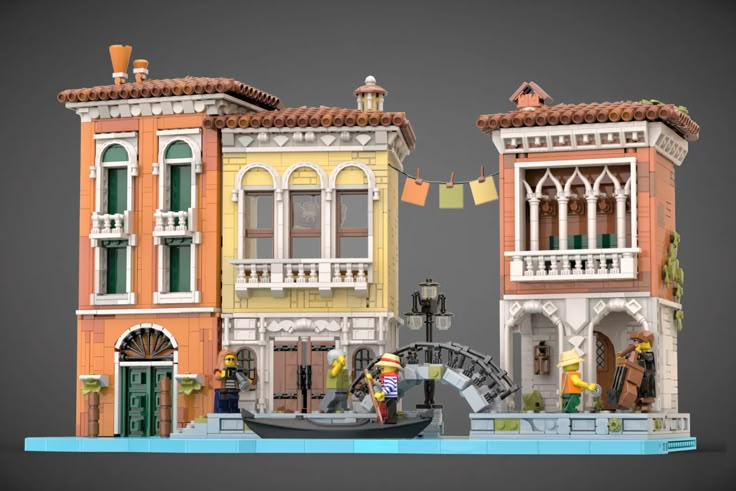 a couple of buildings that are made out of legos and some sort of paper