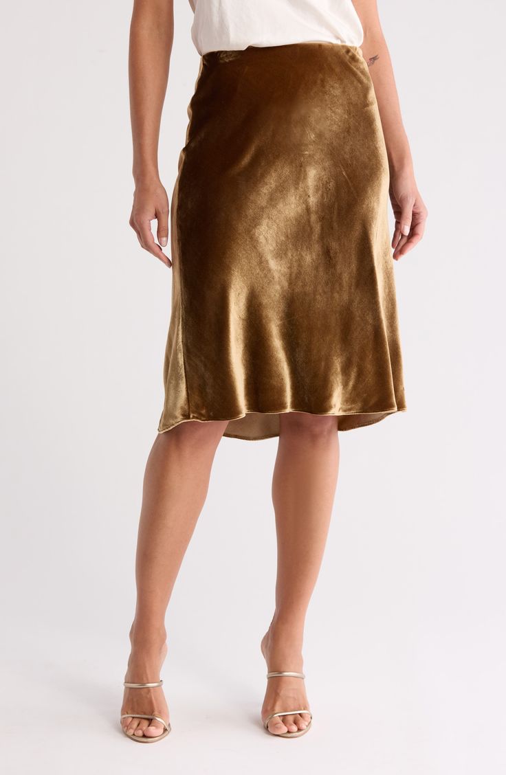 The skirt silhouette of the season is best worn in a silk-kissed satin fabrication. 27" length (size Medium) 82% viscose, 18% silk Dry clean Imported Skirt Outfits Dressy, Satin Skirt Outfit, Dressy Winter, Satin Slip Skirt, Winter Cocktail, Winter Cocktails, Outfits Dressy, Slip Skirt, Satin Slip