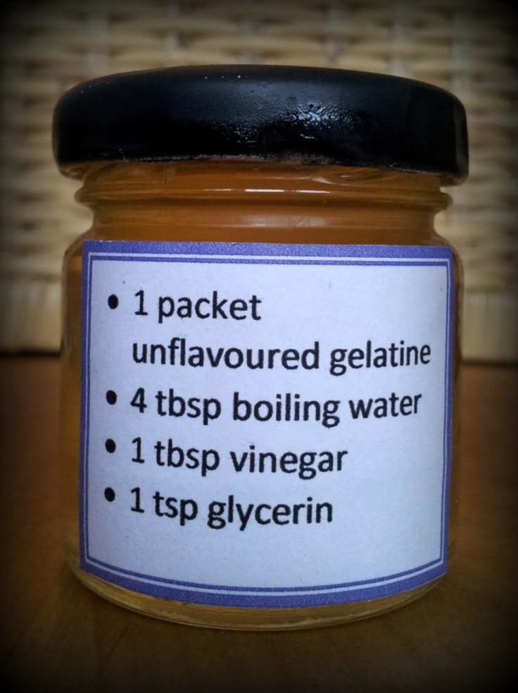 a jar of unflavered gelatin sitting on top of a wooden table