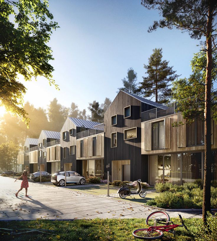 an artist's rendering of a row of houses with bicycles parked on the sidewalk