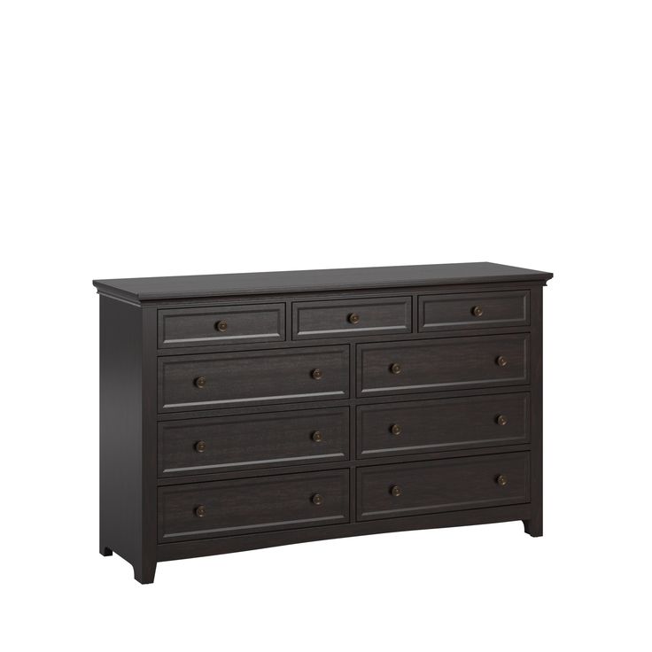 a dark colored dresser with drawers on it