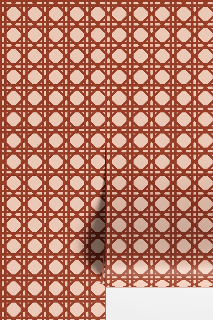 an orange and white wallpaper with hearts on it