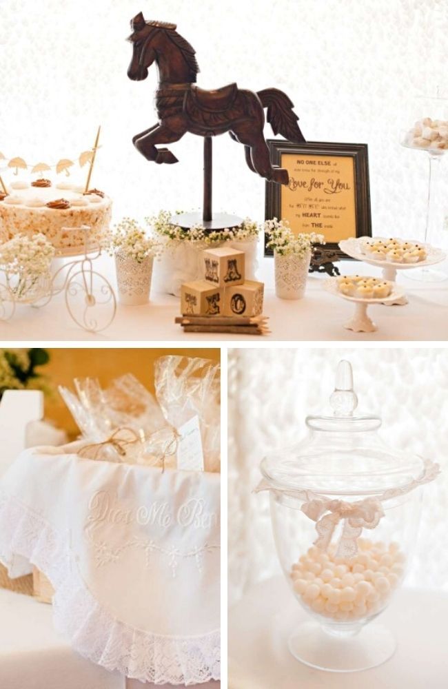 there is a horse and carriage on display in this wedding cake stand, along with other desserts