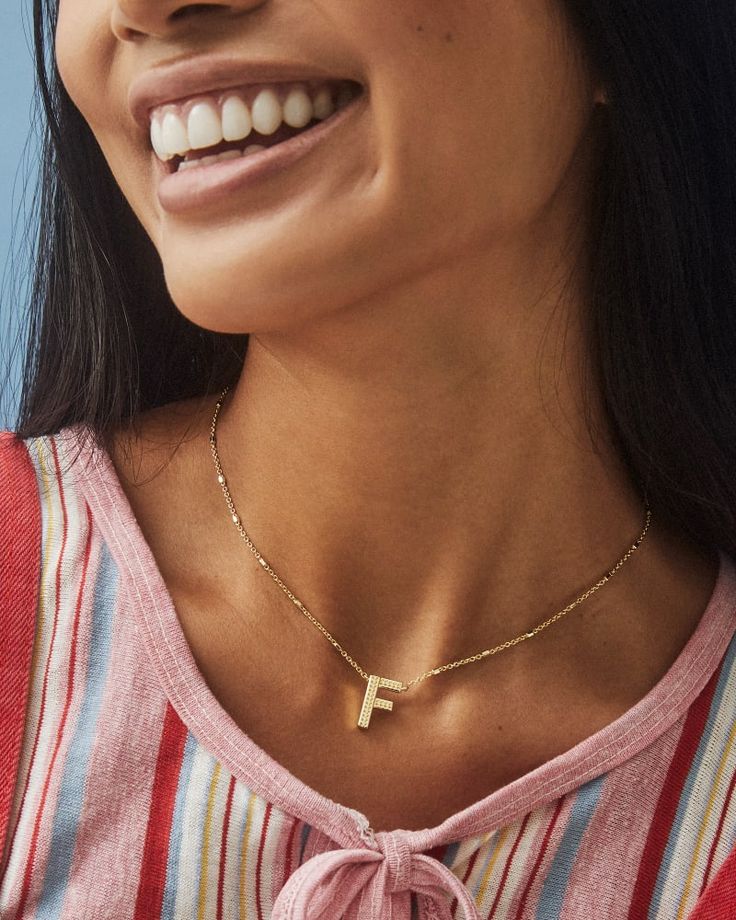 No need to spell it out...The Letter F Pendant Necklace in Gold is sure to be a new favorite. Featuring your initial, or your bestie's, or your crush's (we won't tell), wear a personalized reminder designed with our signature etched detail.,Metal14k Yellow Gold Over Brass Size19 chain, 0.51L X 0.61W pendantClosureLobster clasp with single adjustable sliding bead Please note: Due to the one-of-a-kind nature of the medium, exact colors and patterns may vary slightly from the image shown.} | Kendra Letter A Pendant, The Letter F, Amazon Wishlist, Sold Out Sign, Letter Pendant Necklace, Letter F, Letter A, Letter Pendants, Kendra Scott