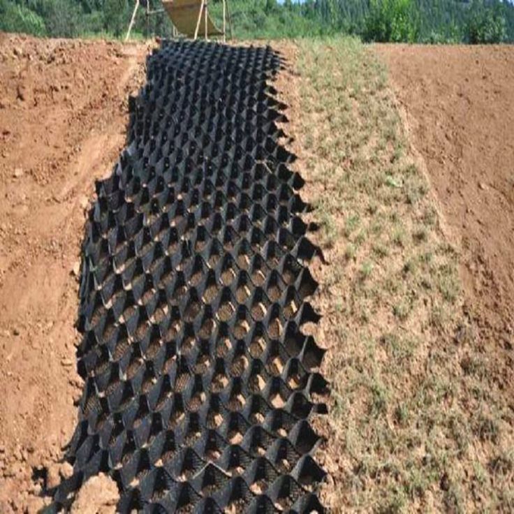 an image of a field that has been laid out with drainage pipes in the middle