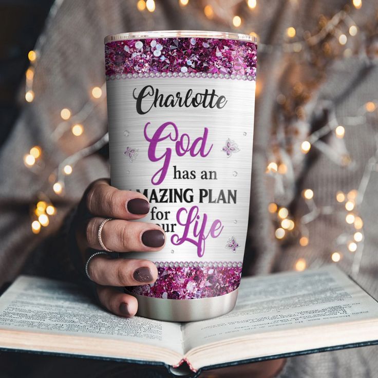 a woman holding a coffee cup with the words charlotte god has an amazing plan for life