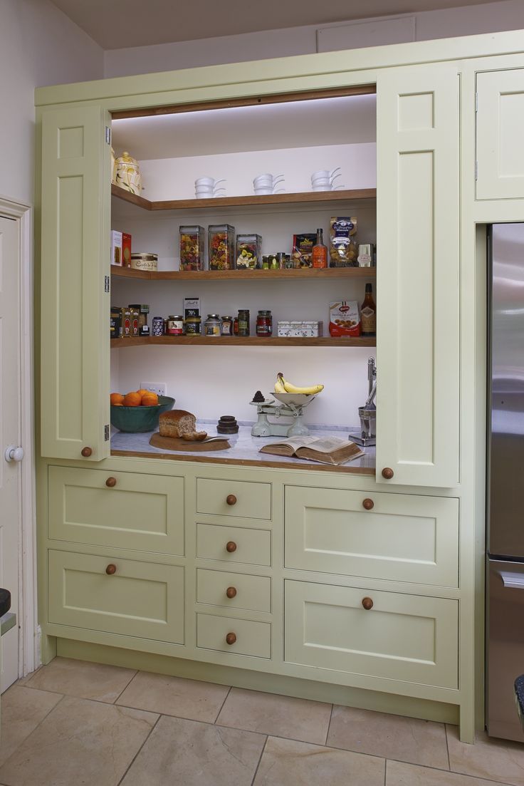 the kitchen is clean and ready to be used as a storage area for food items