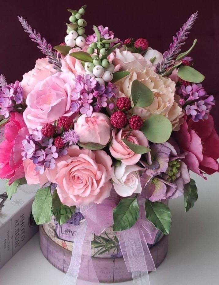 a bouquet of flowers is sitting on a table