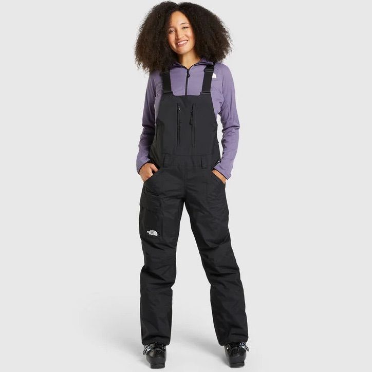 The North Face Women's Freedom Insulated Bib Is A Waterproof And Warm Pant For Snowsports. Skis Or Snowboard, Throwing Snowballs At Your Kids, Whatever Gets You Out There This Winter, These Will Protect. The Dryvent 2l Fabric Offers Waterproof, Windproof And Breathable Protection, Shielding You From Snow, Rain, Sleet And Wind. A 60g Layer Of Heatseeker Eco Insulation Bolsters Against The Coldest Days, While Inner Thigh Vents And The Chimney Venting System Prevents You From Overheating. The Bib S Womens Bib Snow Pants, Black Full Length Skiing Pants, North Face Ski Pants, Sporty Waterproof Snowboarding Bottoms, Casual Full-length Skiing Bottoms, North Face Pants, Outdoor Full-length Ski Pants, Warm Pants, Black North Face