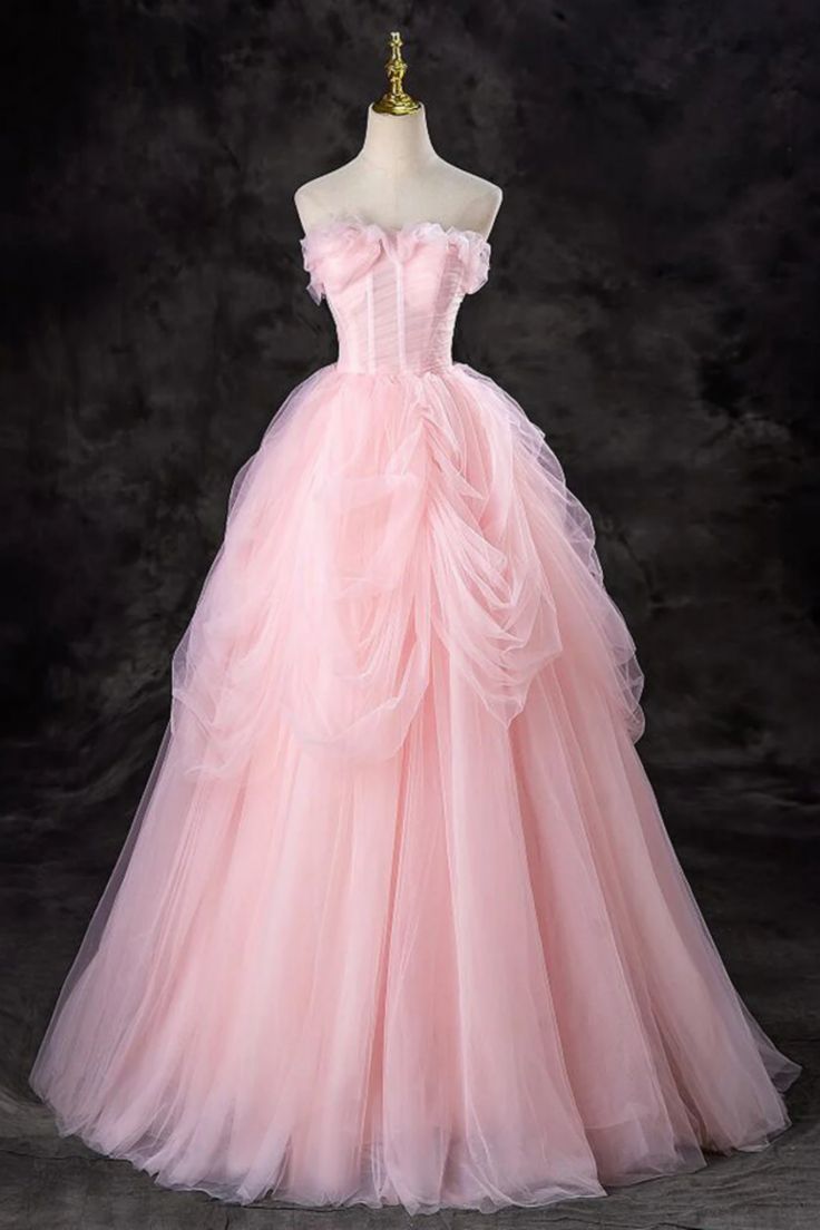 Step into a dream with this Fairytale Pink Tulle Ball Gown. This enchanting dress features a romantic off-shoulder neckline adorned with delicate ruffles, creating a whimsical and ethereal look. The fitted bodice is designed with a corset-like structure, providing both support and a flattering silhouette, making you feel like a princess.The voluminous skirt is crafted from layers of soft pink tulle that cascade gracefully to the floor, adding a sense of movement and elegance to your every step. Sweet Sixteen Dresses Long Princesses, Long Poofy Dresses, Pink Dress For Sweet 16, Pink Sweet Sixteen Dress, Hot Pink Puffy Dress, Pink Angel Outfit, Pink Prom Dresses Poofy, Sweet 16 Big Dresses, Pink Fairy Prom Dress