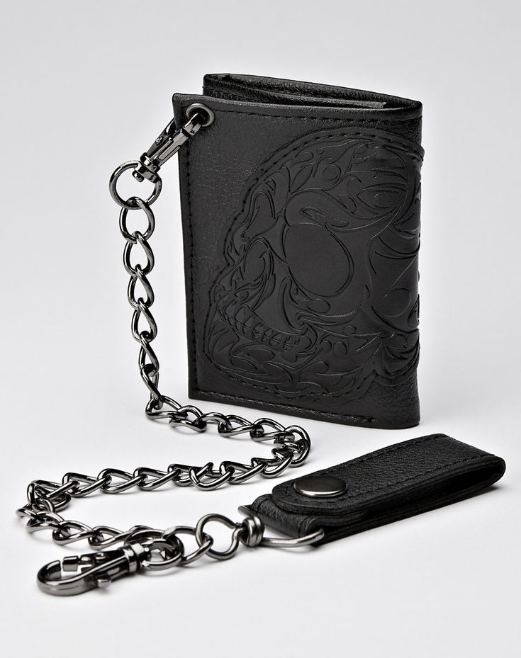 You'll have some badass style and ultimate organization when you use this skull chain wallet. Keep your cash and your cards safe and secure all day long! Snap closure Dimensions: 5" H x 4" W Material: Polyurethane Care: Spot clean Imported Country Boy Outfits, Spencers Gifts, Badass Style, Your Cards, Chain Wallet, Black Horse, Wallet Fashion, Wallet Chain, Buy 1 Get 1