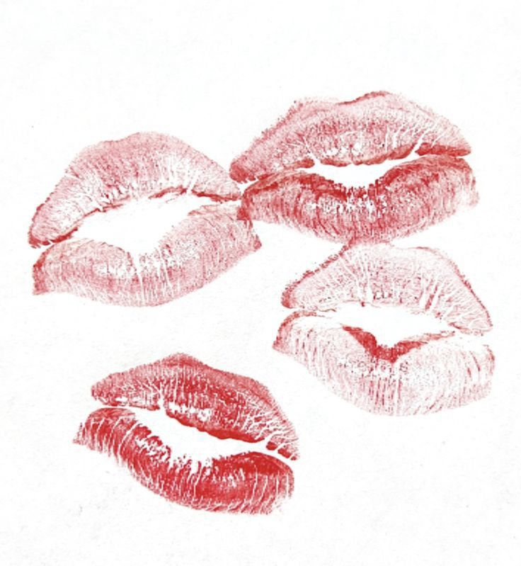 three red lipstick kisses drawn on white paper