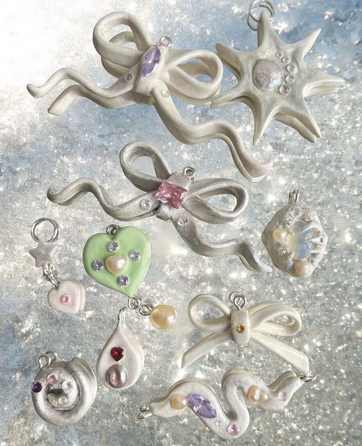 several ornaments are laying on the ground in different shapes and sizes, including starfishs