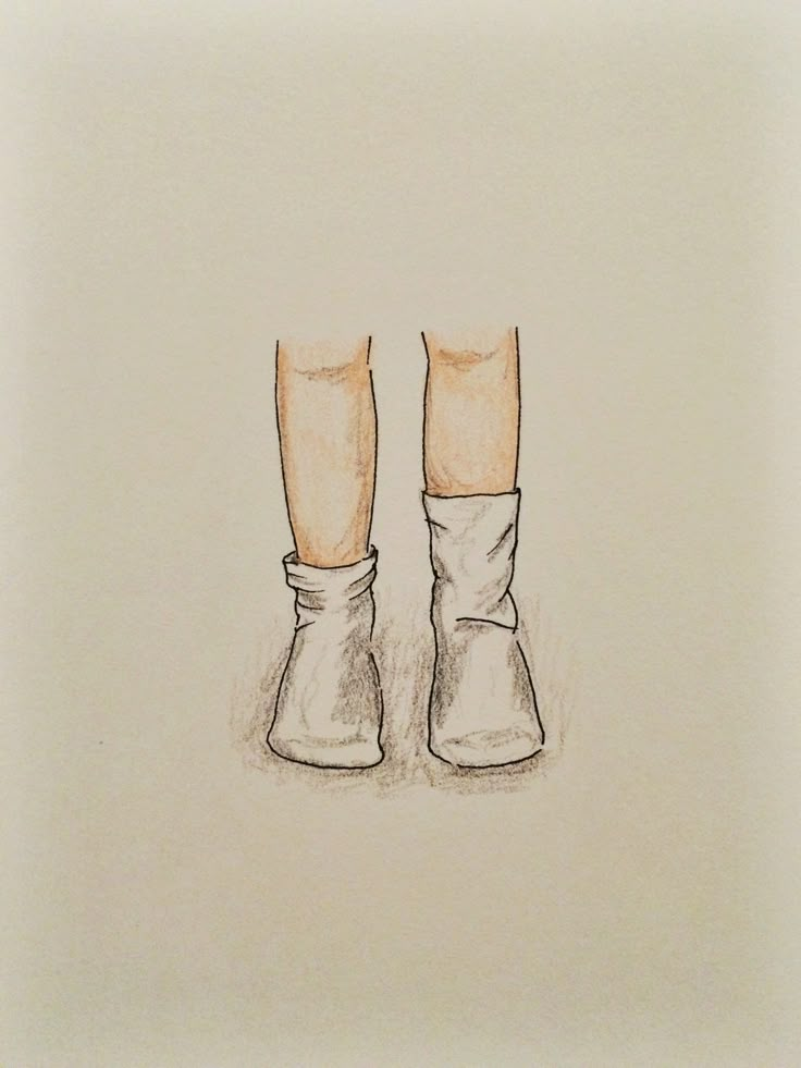 a drawing of someone's feet with their boots on and one leg in the air