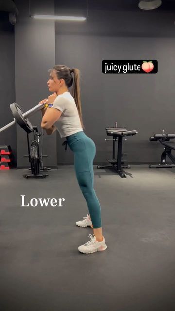 a woman doing squats with a barbell in a gym area, and the caption reads lower glute