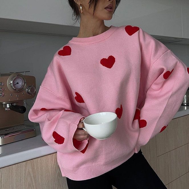 This sweater comes in a knit construction, with a crew neck, ribbed trim, and a heart print all over Size:• S: Bust: 104cm/ 40.9 in, Length: 60cm/ 23.6 in, Sleeves: 52cm/ 20.5 in• M: Bust: 108cm/ 42.5 in, Length: 61cm/ 24.0 in, Sleeves: 53cm/ 20.9 in• L: Bust: 112cm/ 44.1 in, Length: 62cm/ 24.4 in, Sleeves: 54cm/ 21.3 in Material: Polyester Cute Crew Neck Knit Sweater, Red Long Sleeve Sweater For Valentine's Day, Red Long Sleeve Valentine's Day Sweater, Red Heart Print Sweater For Valentine's Day, Red Long Sleeve Sweater With Heart Print, Trendy Heart Print Sweater For Winter, Trendy Winter Sweater With Heart Graphic, Winter Heart Print Sweater, Winter Heart-shaped Sweater With Heart Print