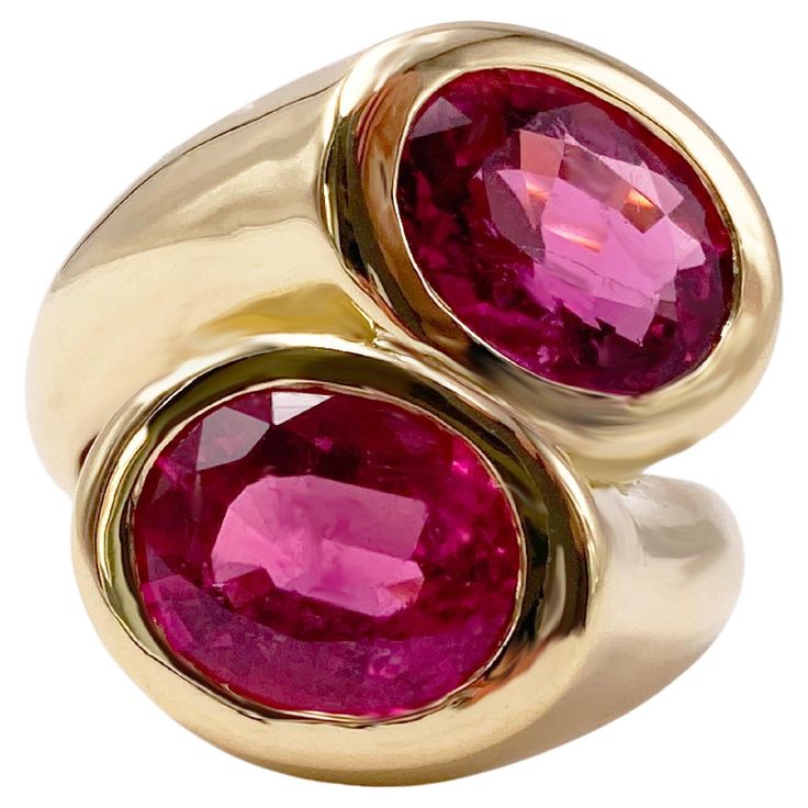 Cocktail ring designed by Rossella Ugolini, sophisticated and rare geometric domed ring, handcrafted in Italy. The ring is very streamlined and smooth and has been crafted as a crossover, in solid 18K yellow gold with a polished finish. It is embellished with two natural Brazilian gemstones: two bright colored Pink Tourmalines Rubellite set in a bezel with two faceted oval cut (10 x 8 mm) of two natural vivid pink Rubellite tourmalines of 8.20 carats . Dimensions: Size 7 Usa and can be sized upo Luxury Yellow Gold Tourmaline Rings, Relationship Rings, Red Tourmaline Fine Jewelry Rings, Cocktail Ring Designs, Luxury Tourmaline Cabochon Rings, Luxury Pink Multi-stone Ruby Ring, Fine Jewelry Tourmaline In Pink, Geometric Dome, Claddagh Ring