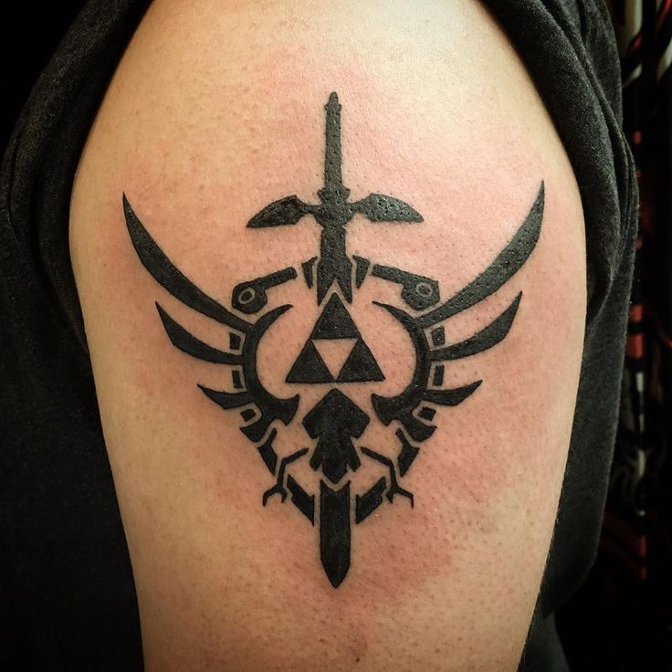 Here's a Zelda logo tattoo from the other day. It's a really cool logo. #tattoo #zelda #gamer #gamertattoo #zeldatattoo #cool #ilovewhatido @bodyartsouljc #jerseycity Zelda Design, Zelda Logo, Zelda Tattoo, Gamer Tattoos, Angel Tattoo, Cool Logo, Black Tattoos, Legend Of Zelda, Jesus Fish Tattoo